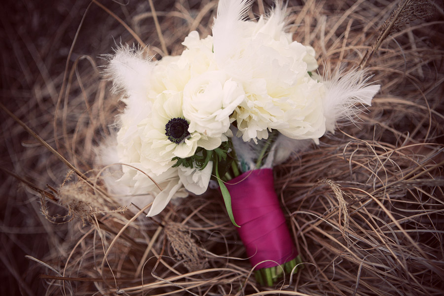 Jenny wanted a classic white bouquet with a touch of fluttery feathers 